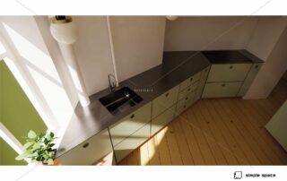 3D-visualisering af vinklet køkkenbord med grønne skuffefronter og mørk bordplade i stål, set fra oven i naturligt lysindfald fra stort hjørnevindue.